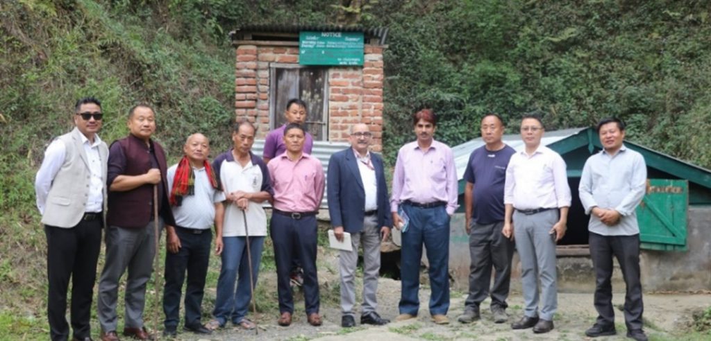 official inspecting Springshed project at Thizama, Kohima district